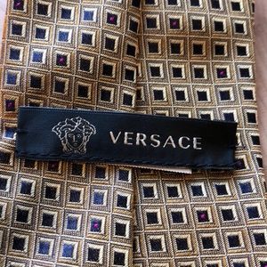 Versace men’s tie with Versace Medusa head detail.